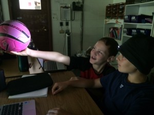 Jaron & Bryce using a headlamp to simulate the sun 